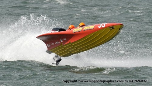 ’Grumpy Mongrel’, Peter Jack and Michael Ethell aboard, goes airborne off Newcastle on its way to winning Production Class.  © Reg Blunt http://www.embphotographics.com.au